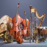 Orchestra musical instruments on grey background. 3d render