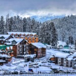 View of Hotels amid snow in Gulmarg, Baramulla Jammu and Kashmir, India on 13 December 2020. The Associated Chamber of Commerce and Industries-Kashmir (CCIK) has expressed its anguish over the non-extension of lease of hotels in Gulmarg.The chamber in a statement said, the members of the Associated Chamber of Commerce and Industries-Kashmir (CCIK) and business community of Kashmir particularly the tourism players are in deep shock over the aggressive and coercive measures taken by authorities against hotels in Gulmarg who have been existing there from more than 40 years. As informed though all the formalities for extension of lease have been completed by the lessees in time their lease has not been extended for reasons best known to the powers that be. It may not be improper to say that they are being penalised for no fault of theirs. (Photo by Nasir Kachroo/NurPhoto via Getty Images)