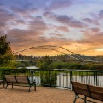 Park benches along Willamette River at Riverfront City Park in Salem Oregon during sunset