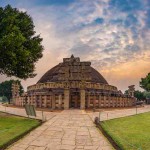 Sanchi Stupa, Madhya Pradesh, India. Ancient buddhist building, religion mystery, carved stone. Sunrise sky.