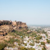 India. Gwalior Fort (8th century) in the central Indian state of Madhya Pradesh. Built on an isolated hillock overlooking the Gwalior town.One of the biggest forts in India.